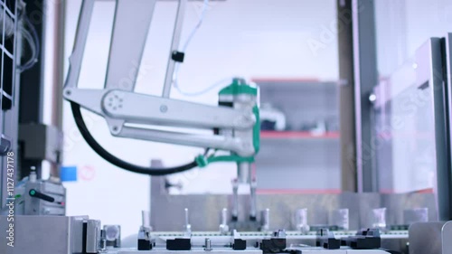 Pharmaceutical Factory - Aerial View of Medicine Packaging on Conveyor Belt in Production Line. Industrial Automation for Efficient Drug Packaging Process in Modern Pharmaceutical Facility