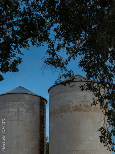 silos against blue sky