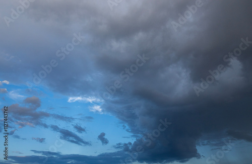storm clouds against blue sky