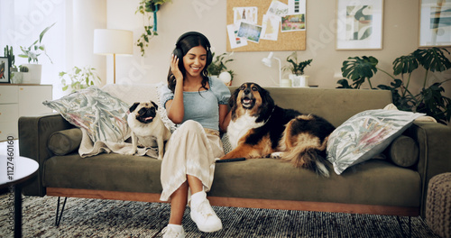 Canvas Print Happy woman, home and dogs with headphones, music listening and bonding for love, companion and play