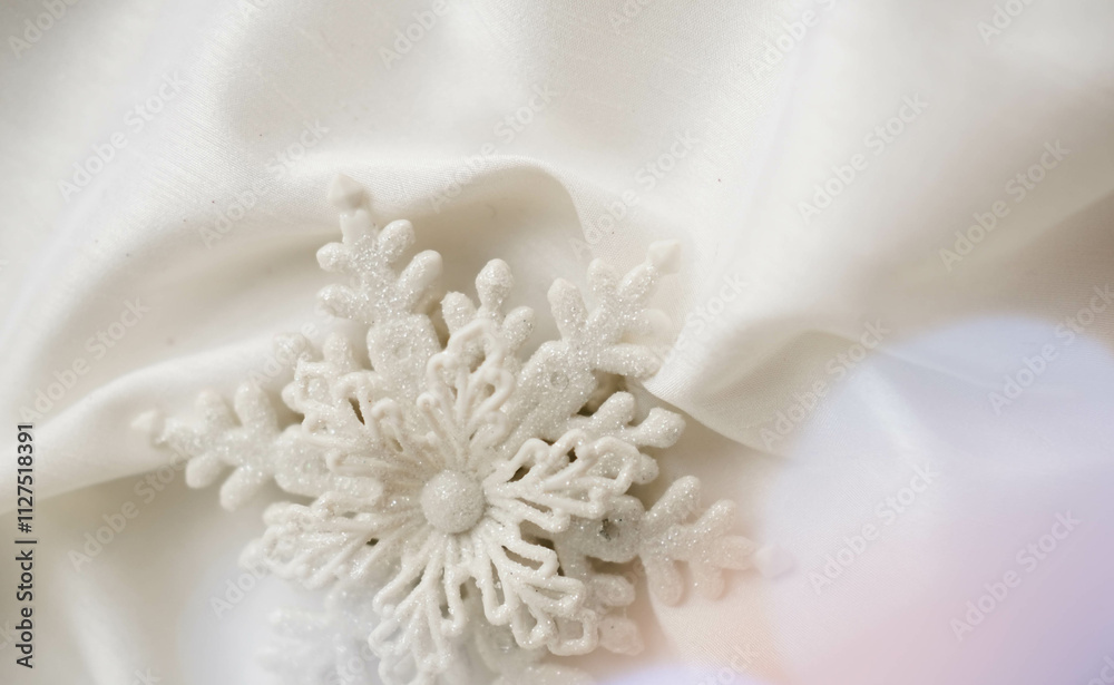 Minimalist Winter Decor: Snowflake on Draped Fabric Minimalist Winter Decor: Snowflake on Draped Fabric