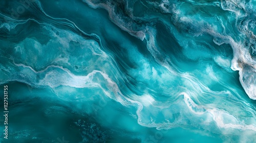 A vibrant turquoise salt lake with rippling waves and crystalline shorelines.