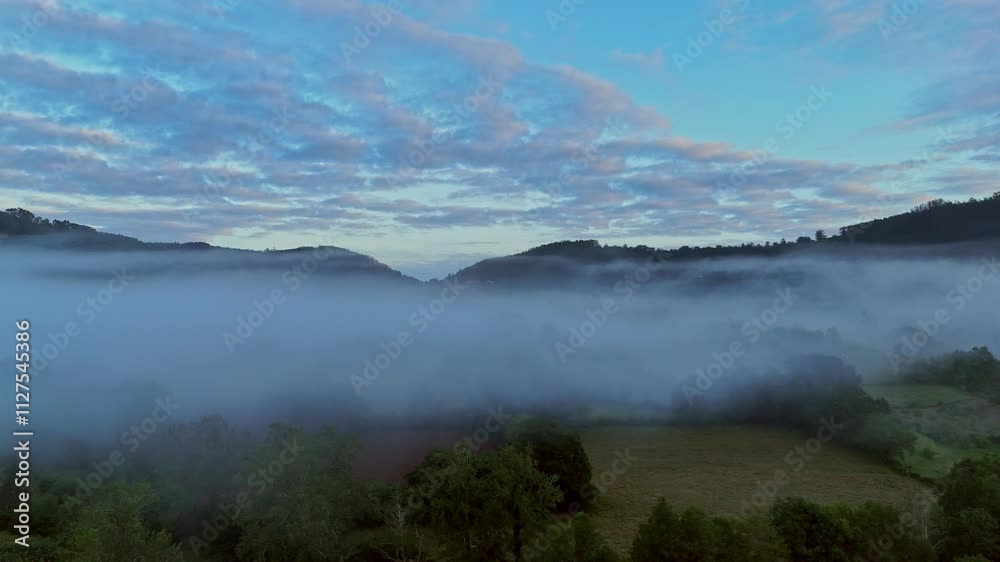 Misty dawn over Asturias landscape, a serene morning view Misty dawn over Asturias landscape, a serene morning view