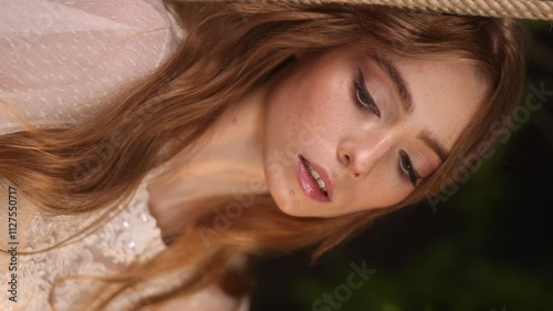 Portrait of a young beautiful woman with blue eyes.