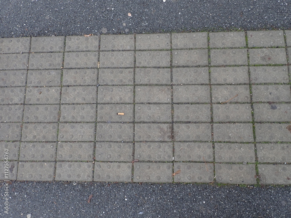 Fototapeta premium grey city pavement tiles texture