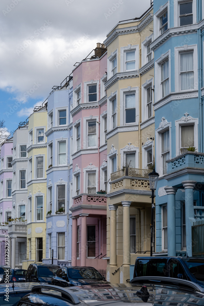 Touristic route on Notting Hill, walking on streets with colourful houses, Portobello road, city life, wealthy neighbourhoods in London, UK Touristic route on Notting Hill, walking on streets with colourful houses, Portobello road, city life, wealthy neighbourhoods in London, UK