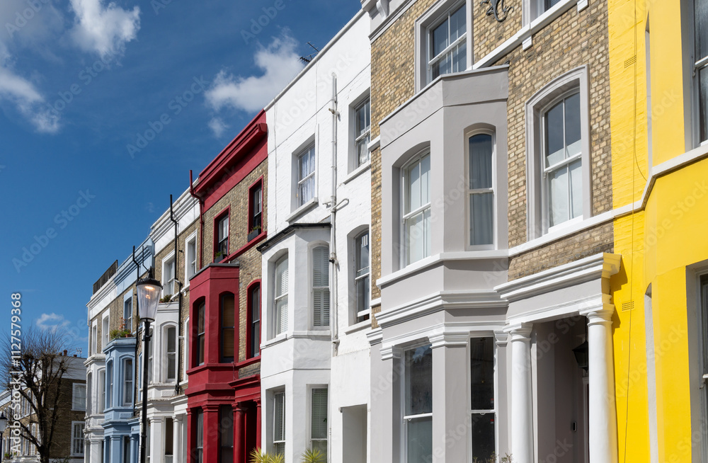 Obraz premium Touristic route on Notting Hill, walking on streets with colourful houses, Portobello road, city life, wealthy neighbourhoods in London, UK