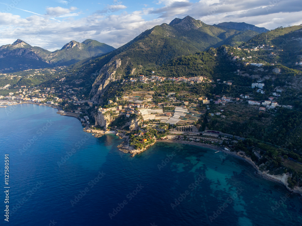 Obraz premium Aerial view on French Riviera, Menton and Mediterranean Sea as seen from French-Italian border in Grimaldi village, Ventimiglia, travel destination, panoramic view from above