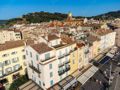 Aerial view on bays, beaches, old colorful houses of famous Saint-Tropez town on French Riviera, Var, Provence, France, summer vacation destination