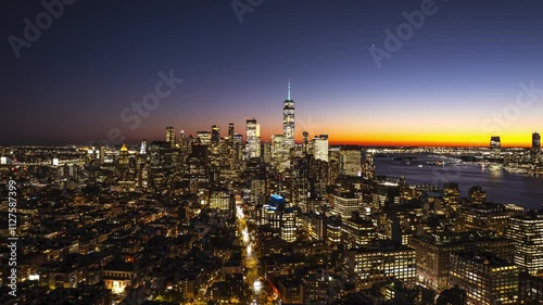 Aerial timelapse captures transition of the sky from blue to black as night envelops Manhattan's Lower East Side and Financial District in New York City