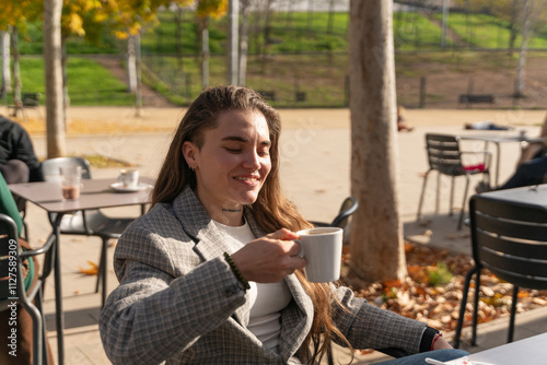 Relaxing with a cup of coffee outdoors. photo