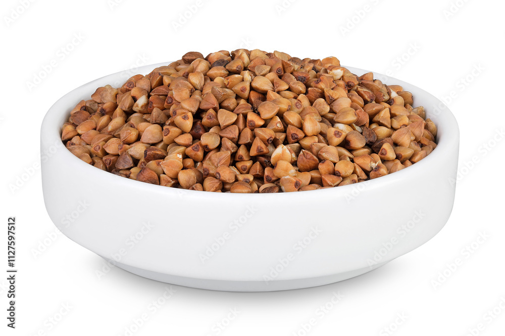Raw buckwheat in ceramic bowl isolated on white background Raw buckwheat in ceramic bowl isolated on white background