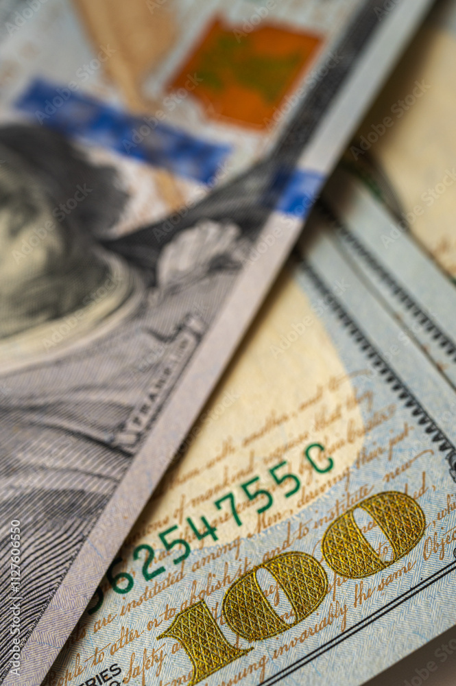 Obraz premium vertical photo, background, Close-up view of a 100 dollar bill with details, texture and vibrant colors. Perfect for finance, banking and wealth themes, vertical photo, wallpaper