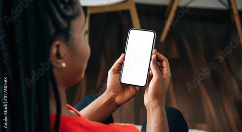 Mockup image of a beautiful woman holding and showing smartphone or mobile phone with blank white screen photo