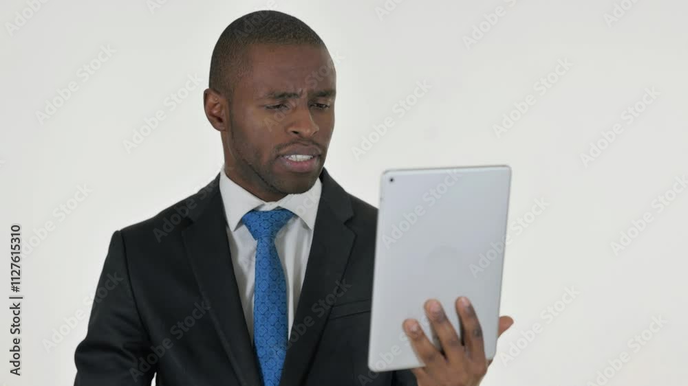 Portrait of African Businessman Doing Video Chat on Tablet on White Background Portrait of African Businessman Doing Video Chat on Tablet on White Background