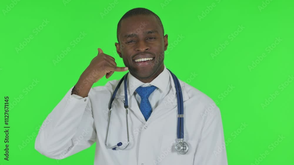 Portrait of African Doctor inviting People for Help, Call Me on Green Background Portrait of African Doctor inviting People for Help, Call Me on Green Background