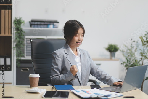 Portrait of smile beautiful business asian woman suit working office desk computer. Small business sme people employee freelance online start up marketing asian designer telemarket successful banner