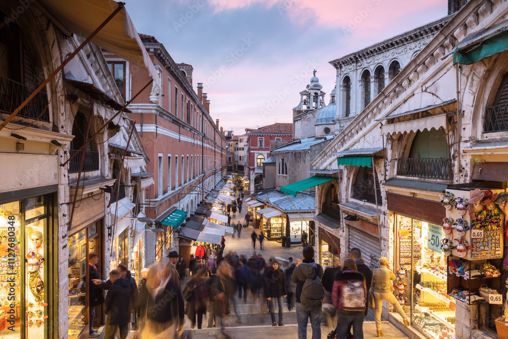 People walking to the market on Rialto bridge, Venice, Italy People walking to the market on Rialto bridge, Venice, Italy