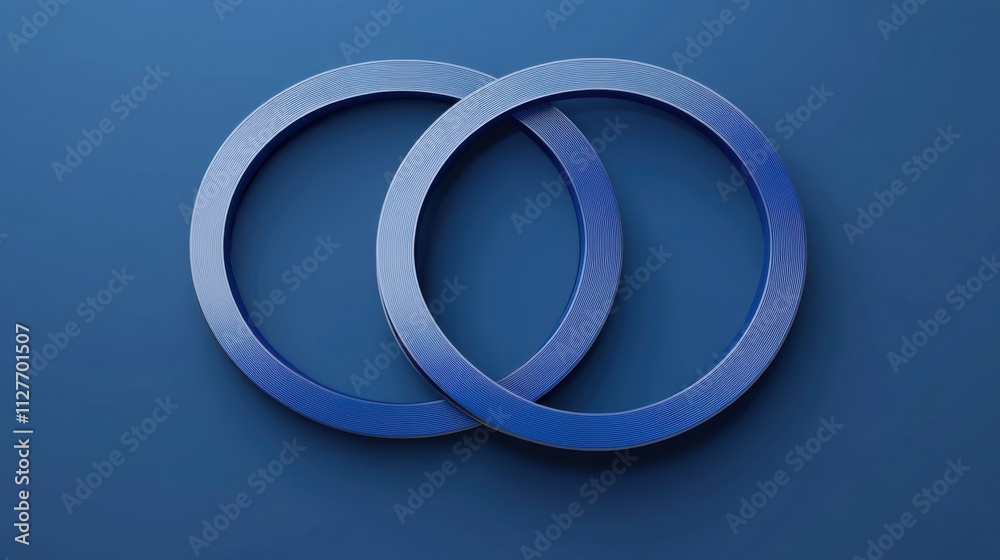 Two interlocking blue rings representing connection and partnership on blue background Two interlocking blue rings representing connection and partnership on blue background