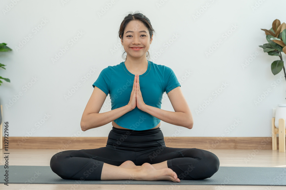 woman practicing meditate in the room . Asian woman doing exercises in morning. balance, recreation, relaxation, calm, good health, happy, relax, healthy lifestyle, reduce stress, peaceful, Attitude. woman practicing meditate in the room . Asian woman doing exercises in morning. balance, recreation, relaxation, calm, good health, happy, relax, healthy lifestyle, reduce stress, peaceful, Attitude.