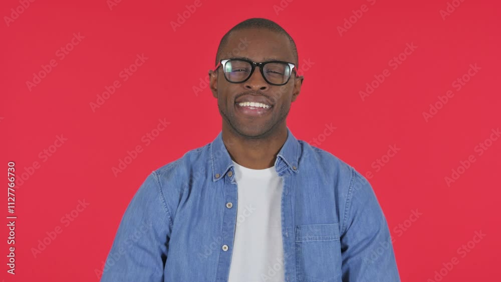 Casual African Man with Thumbs Up on Red Background, Portrait Casual African Man with Thumbs Up on Red Background, Portrait
