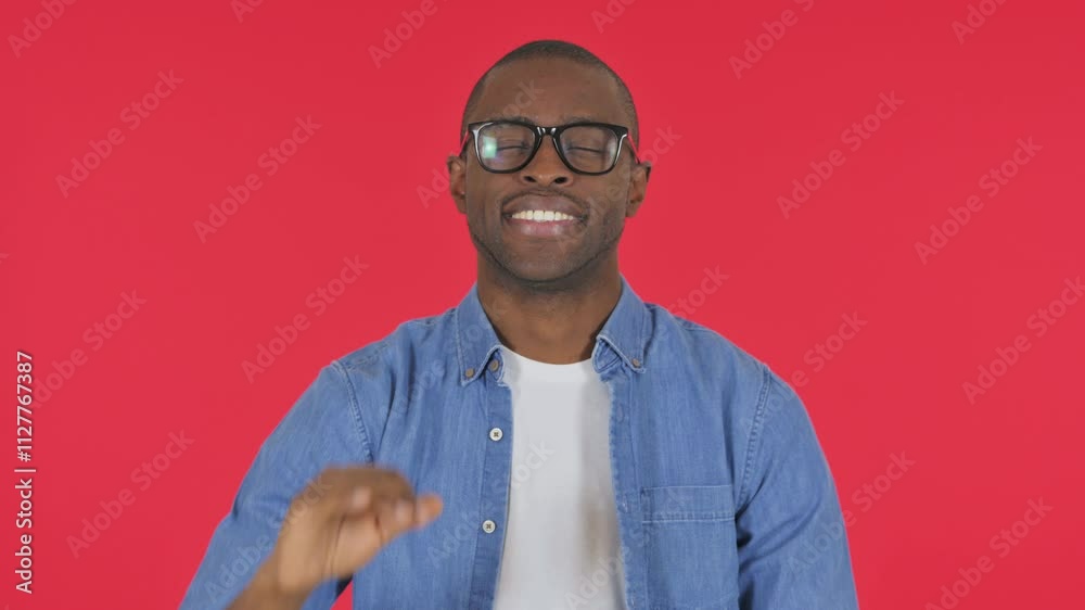 Casual African Man with Okay Sign on Red Background, Portrait Casual African Man with Okay Sign on Red Background, Portrait