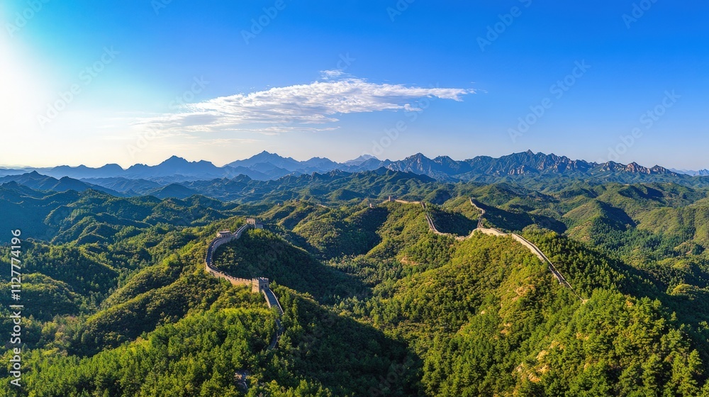 Fototapeta premium Great Wall winds through green mountains.