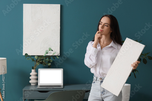 Thoughtful young woman with...