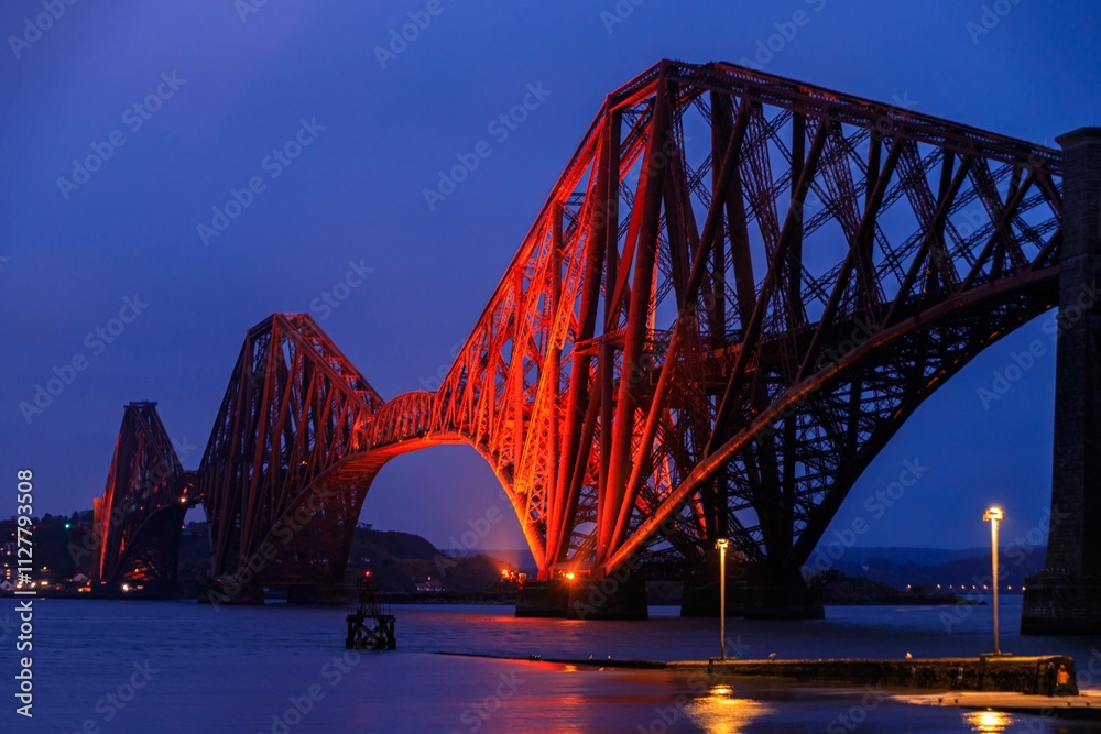 Naklejka premium Iconic Forth Bridge, UNESCO World Heritage, Illuminated at Twilight, Edinburgh, Scotland