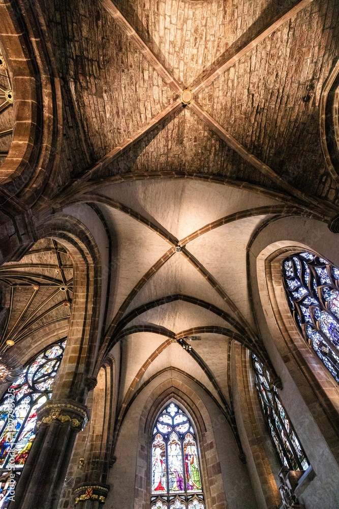 Intricate Stained Glass Windows in Historic Cathedral Intricate Stained Glass Windows in Historic Cathedral