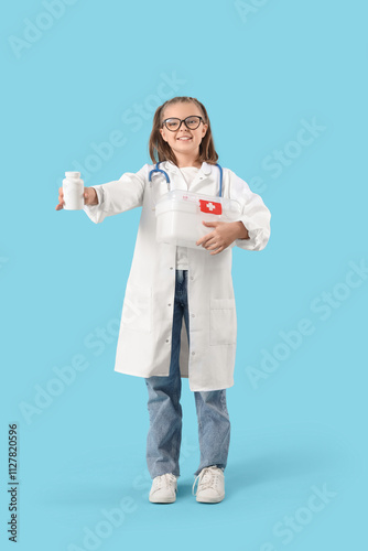 Cute doctor with first aid ...