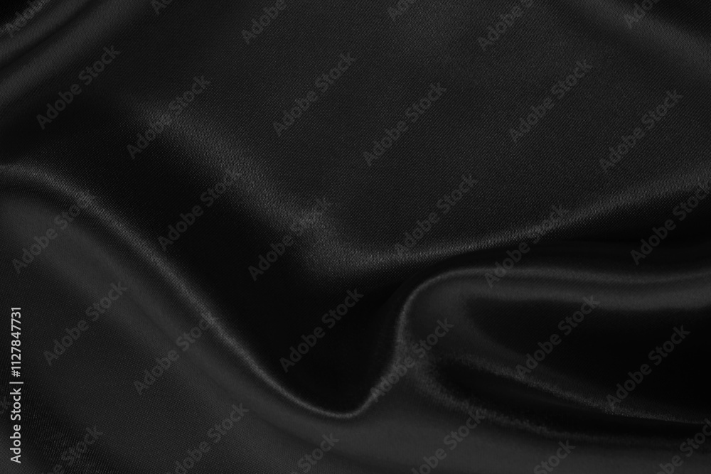 Fototapeta premium Black fabric cloth texture for background and design art work, beautiful crumpled pattern of silk or linen.