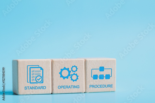 SOP, Standard operating procedure concept. SOP icon on wooden block for the standard operating procedure with instruction, quality, process, operation, sequence, workflow.