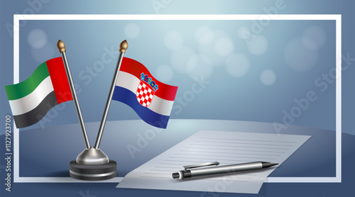 United Arab Emirate and Croatia National flags on small table with bokeh background, cooperative relationship