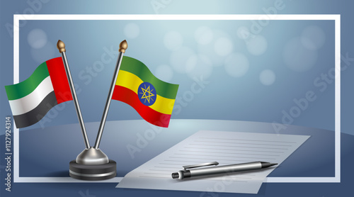United Arab Emirate and Ethiopia National flags on small table with bokeh background, cooperative relationship