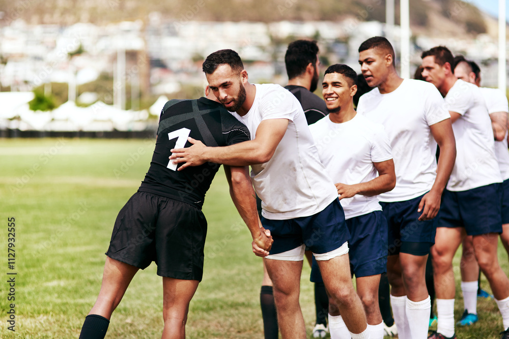 Rugby, team and hug for respect, introduction or sportsmanship on grass field outdoors. Sports men shaking hands and greeting for game rival, competition or training with workout and exercise Rugby, team and hug for respect, introduction or sportsmanship on grass field outdoors. Sports men shaking hands and greeting for game rival, competition or training with workout and exercise