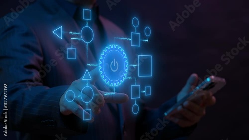 Business process and workflow automation with flowchart. Business and technology concept. Businessman push on power button to shows arranging processing management on virtual screen.