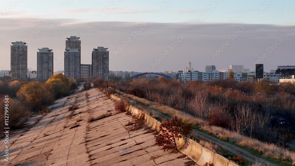 Slow Aerial Reveal of Vacaresti Delta at Sunset with Bucharest Cityscape in the Background, Romania Slow Aerial Reveal of Vacaresti Delta at Sunset with Bucharest Cityscape in the Background, Romania