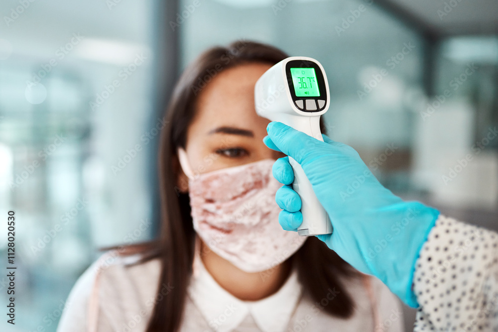 Covid, thermometer and woman in workplace, mask and check for health, safety and risk management. Face cover, people and employee with virus, company policy and regulations for pandemic or protection Covid, thermometer and woman in workplace, mask and check for health, safety and risk management. Face cover, people and employee with virus, company policy and regulations for pandemic or protection