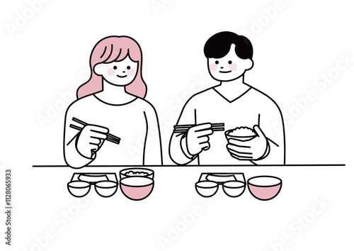 栄養のある食事をしている若い夫婦