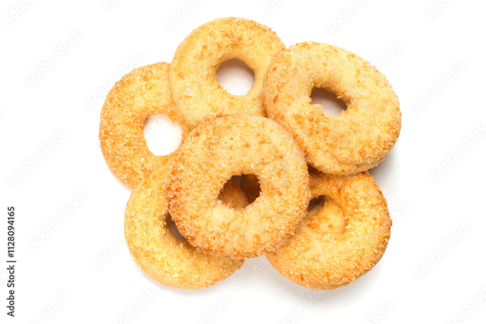 A pile of round cookies with a hole on a white background. Lots of sweet cookies top view. A pile of round cookies with a hole on a white background. Lots of sweet cookies top view.