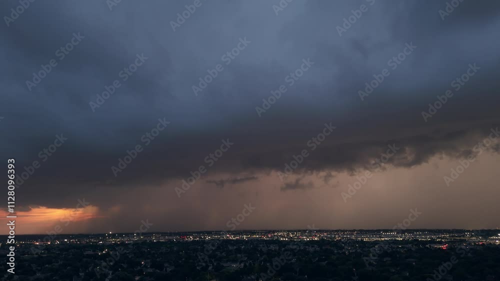 Drone wide shoot of Stormy clouds sky before heavy rainfall and lightning over suburban town . Drone wide shoot of Stormy clouds sky before heavy rainfall and lightning over suburban town .