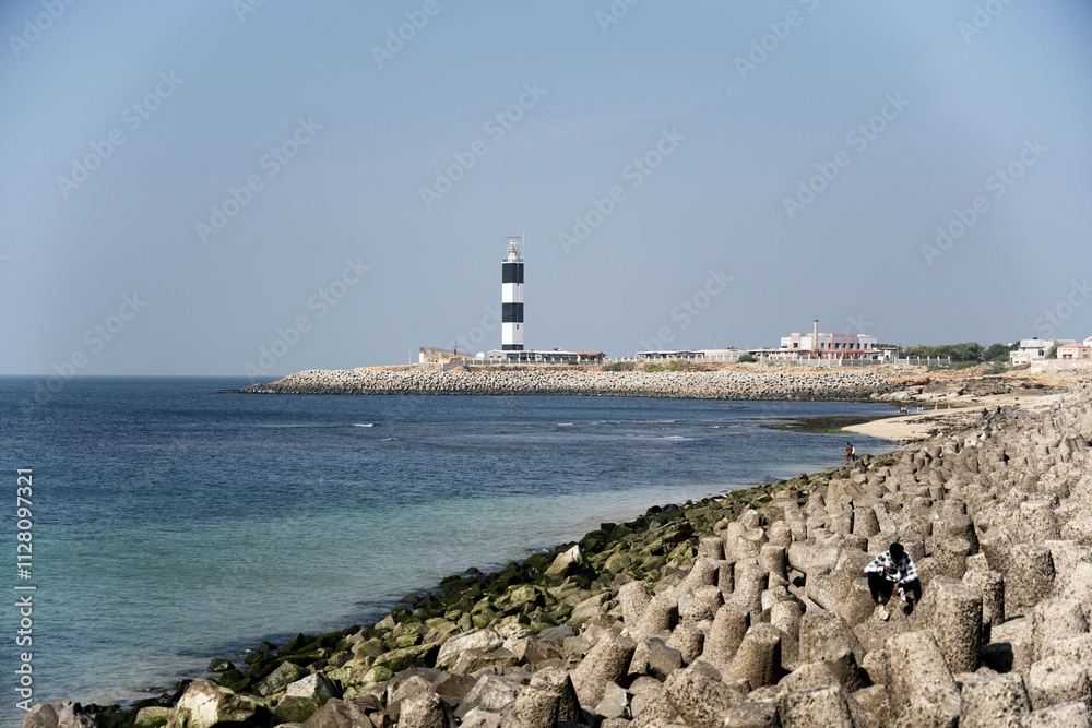The majestic Dwarka Lighthouse facing the Arabian Sea