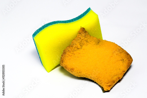 Old and new Scouring Pad or Kitchen Sponge on isolated white background, mainly used for washing dishes photo