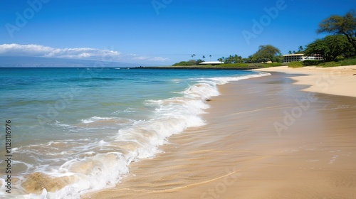 Beautiful Sandy Beach with Soft Blue Ocean Wave, Golden Sand, Gentle Ripple, Ideal Place for Relaxation and Enjoying the Seaside Scenery.