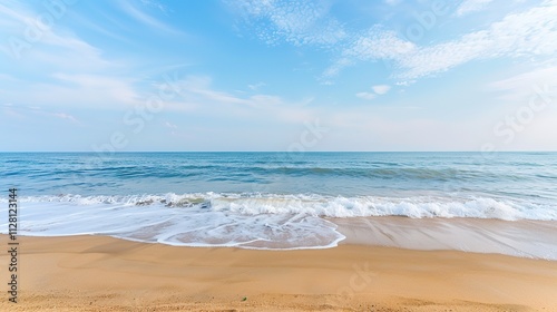 Beautiful Sandy Beach with Soft Blue Ocean Wave, Golden Sand, Gentle Ripple, Ideal Place for Relaxation and Enjoying the Seaside Scenery.
