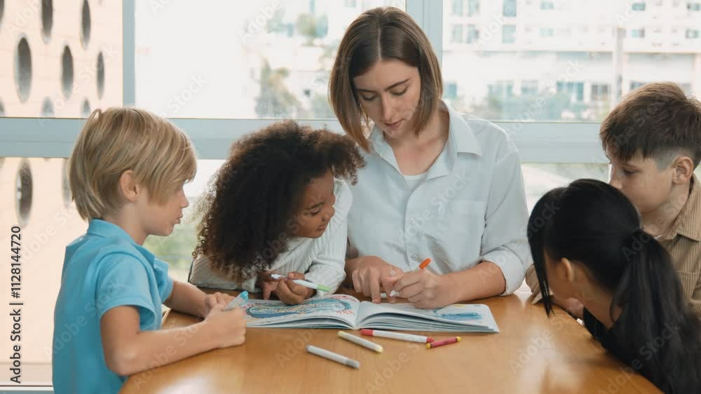 Happy diverse student and smart teacher drawing and coloring by using marker at drawing book. Multicultural smart learner using drawing book while talking to skilled caucasian instructor. Erudition. Happy diverse student and smart teacher drawing and coloring by using marker at drawing book. Multicultural smart learner using drawing book while talking to skilled caucasian instructor. Erudition.