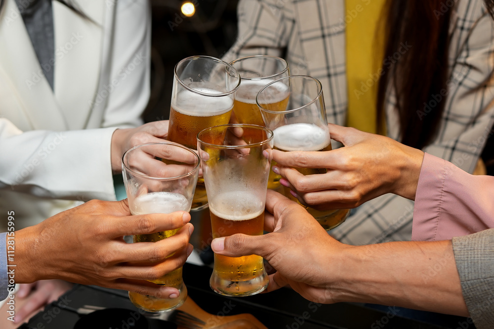 food and drink male friends are happy drinking beer and clinking glasses at a bar or pub. food and drink male friends are happy drinking beer and clinking glasses at a bar or pub.