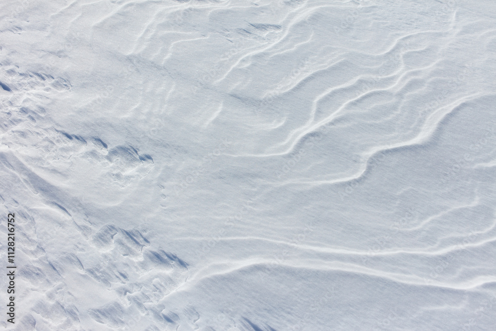 The snow is white and the ground is covered in it The snow is white and the ground is covered in it