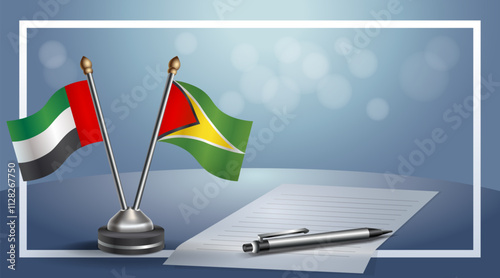 United Arab Emirate and Gunaya National flags on small table with bokeh background, cooperative relationship